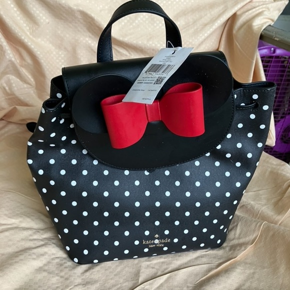 minnie backpack
K4642
disney x kate s black mult (001) BLC
Other